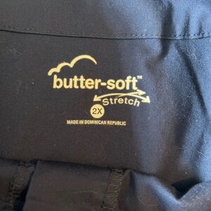 Butter Soft Stretch Dark Blue Scrub Jacket. Button up. Pleated.